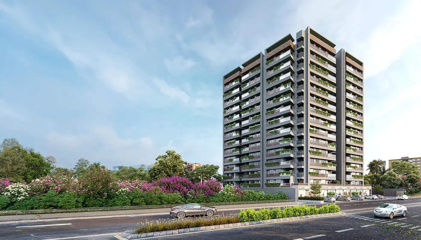 Rivanta Vibgyor residential tower above flowering gardens beside the road